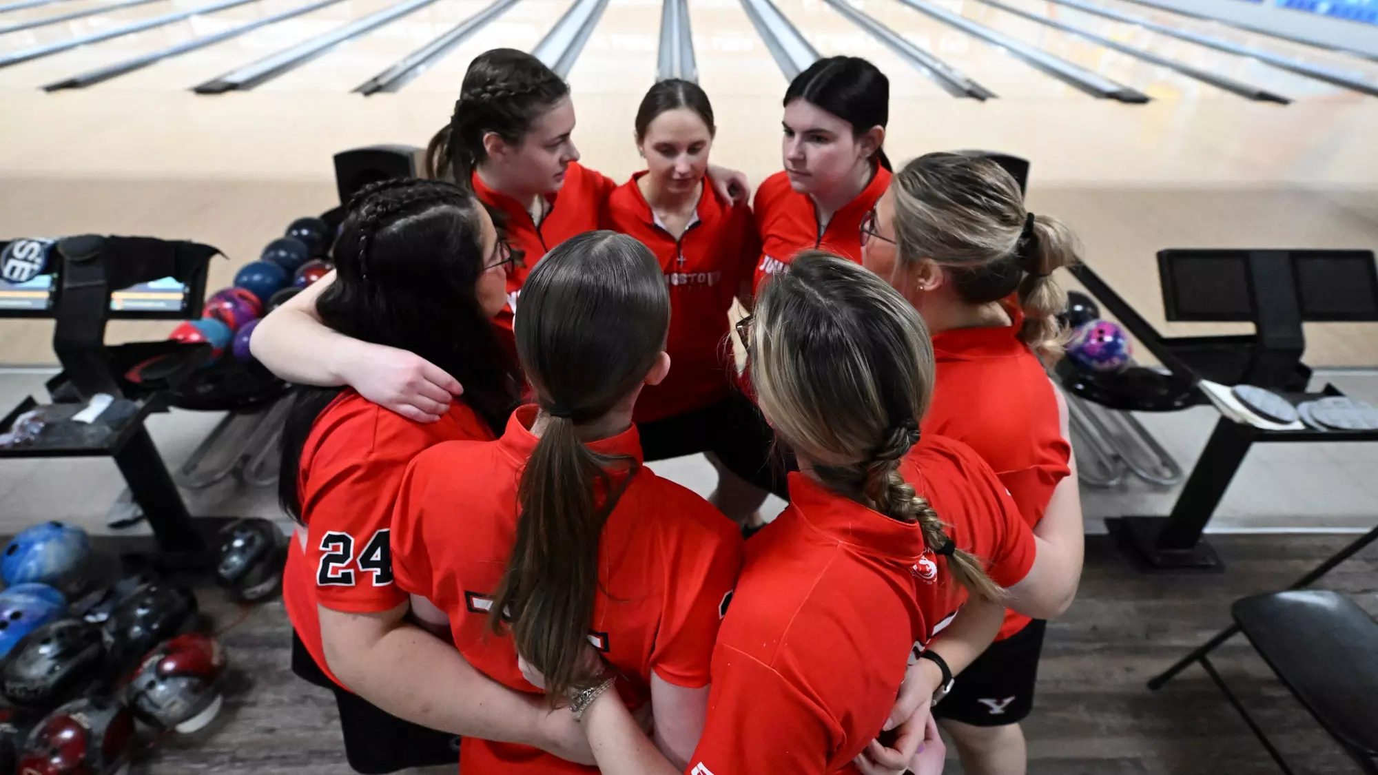 Bowling team celebrating together after a match