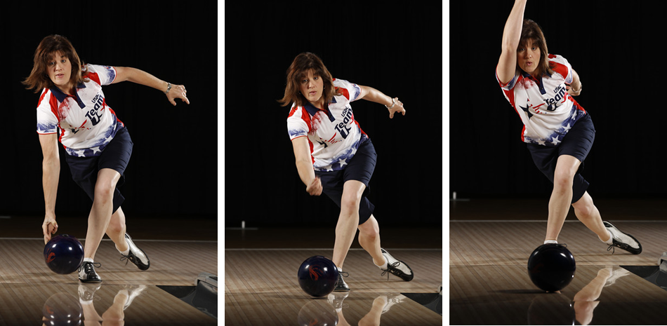 Bowling coach showing proper throwing technique